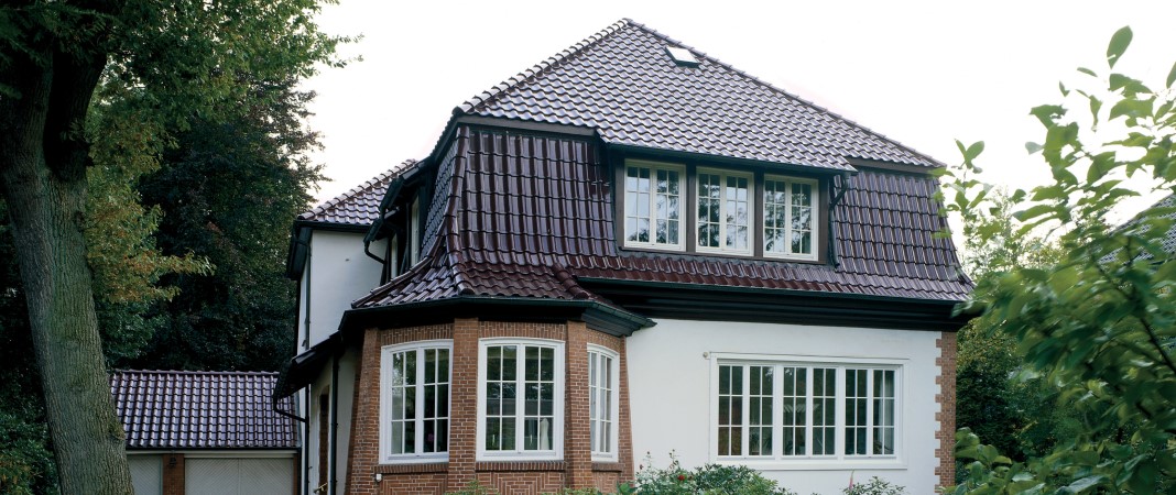 Bild von Einfamilienhaus mit Hohensteiner Tondachziegel von Braas